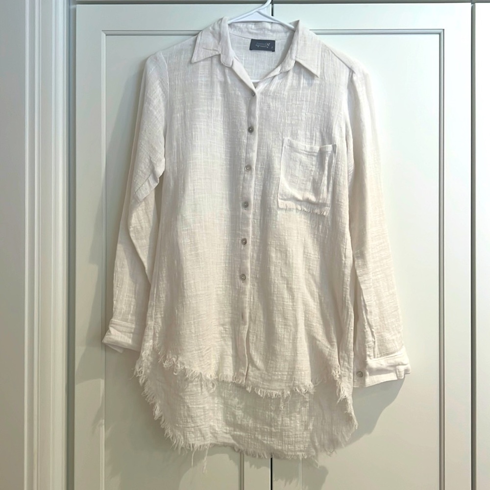 Figwood white blouse with unfinished edge.